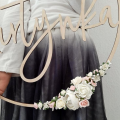 round decoration with flowers and name