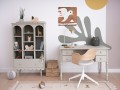 Oliwkowy regał dziecięcy Babushka z dekoracyjną falbanką i pojemnymi półkami marki Wood Luck Design