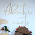 Wooden inscription on the wall for a child's room